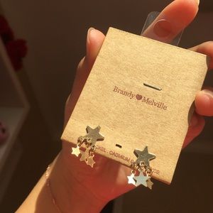 dangly gold stud star earrings